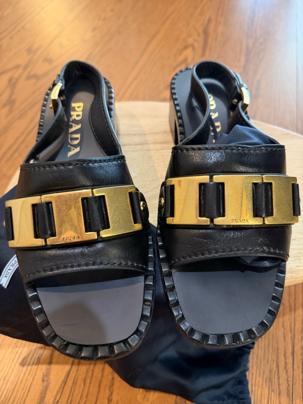 Prada Black Leather Sandals with Gold-Tone Buckle